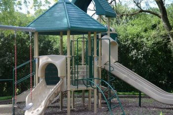 Columbus Park playground slides and climbing structure.