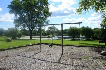 Columbus Park playground swingset, with amenities for multiple age ranges